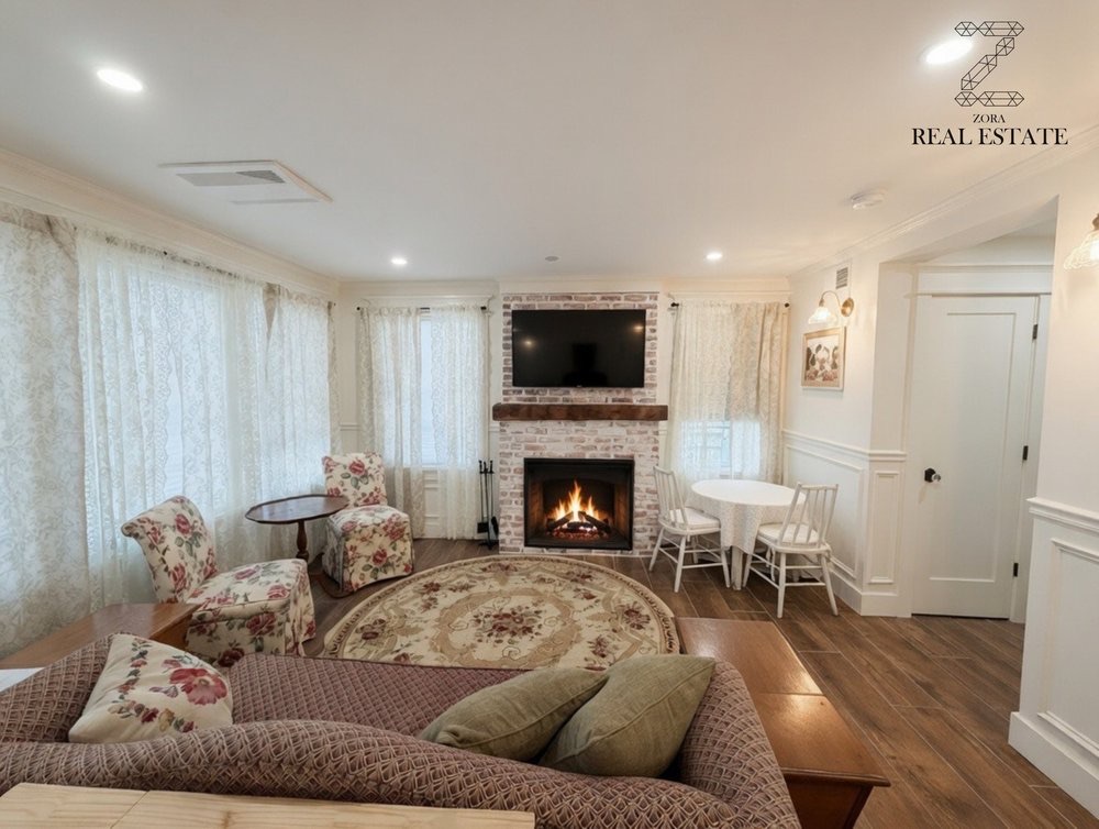 Living room with fireplace at 375 Blumel Road